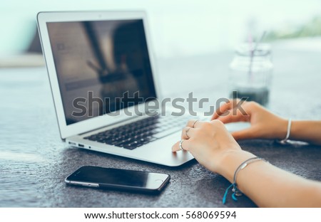pretty young beauty woman using laptop in cafe, outdoor portrait business woman, hipster style, internet, smartphone, office