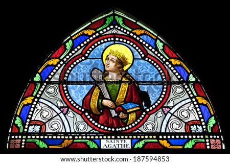 SAMUT SAKHON, THAILAND - APRIL 12: Stained glass window depicting saint in Christ Church on April, 12, 2014.