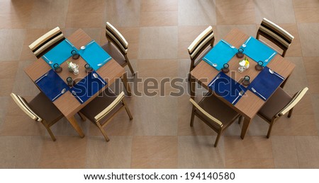 Top View of an elegant dining table setting with a blue cloth.