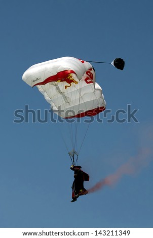 BELGRADE-JUNE 22:Skydiver with a Red Bull sign on the\