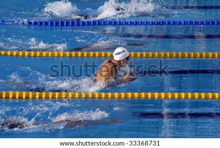 BELGRADE - JULY 5: 25th UNIVERSIADE - Swimming Men\'s 100m Breaststroke Semifinals race Winner is Siladi Caba (SRB) with time 59:90 second - Universiade Record July 5th 2009 in Belgrade, Serbia