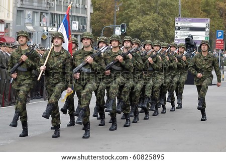 BELGRADE - SEPTEMBER 11th:Promotion of new Serbian army officers,Serbian national flag unit in march ,September 11, 2010 in Belgrade, Serbia