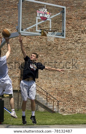 BELGRADE, SERBIA-MAY 28. Unidentified basketball player tries to block the ball during the qualification tournament of \