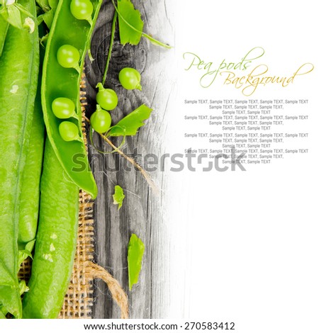 Photo of pods with peas on wooden board with white space