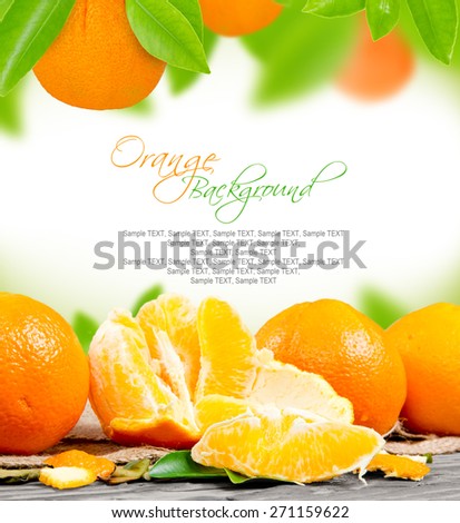 Photo of orange with leaves and slice with white space for text