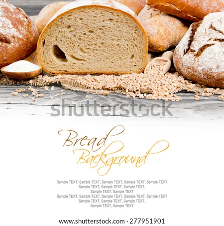 Bread slice with wheat seeds and flour on burlap with white space for text