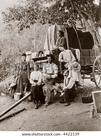 Pioneer settlers, homesteaders, covered wagon - circa 1890 vintage photo