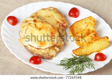 European cuisine. Meat in French with fried potatoes