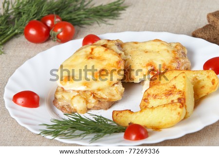 European cuisine. Meat in French with fried potatoes