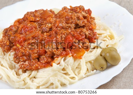 Italian cuisine. Pasta with meat sauce