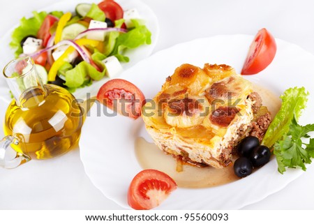Greek cuisine. Moussaka and greek salad