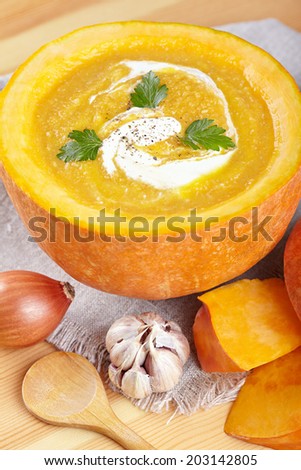 Pumpkin soup served in a pumpkin