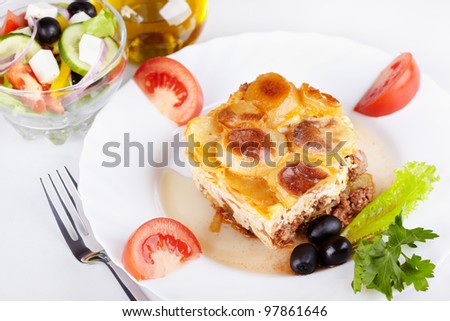 Greek cuisine. Moussaka and greek salad