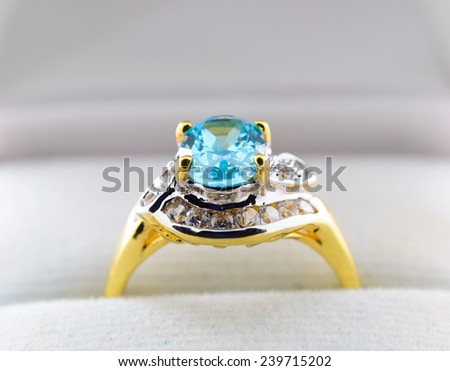 Ring of the jewelry with sapphire on the white background.