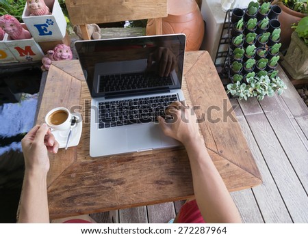 man work on your laptop in cofee cafe