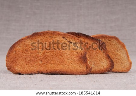 Bread crumbs on a linen background