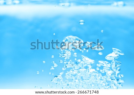 closeup of blue bubbles underwater