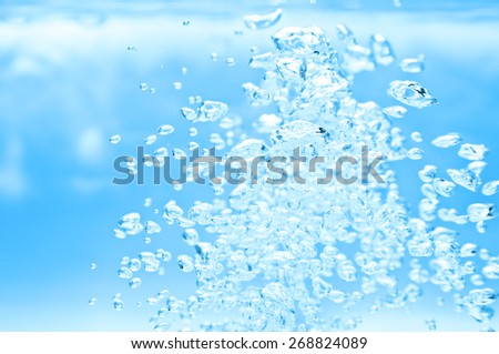 closeup of blue bubbles underwater