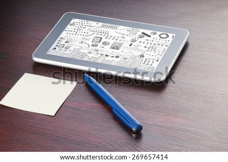 Tablet PC with the scheme of doing business on the screen on the desk