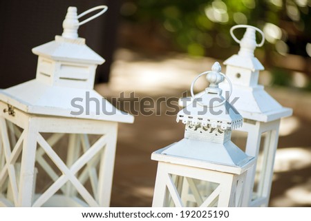 white lanterns in the garden