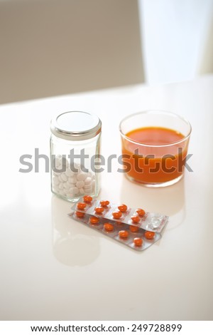 Vitamin tablets and vegetable juice