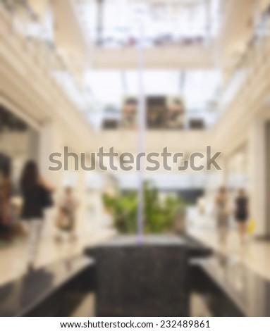 Store shop blur background modern style Interior department store with customer walking