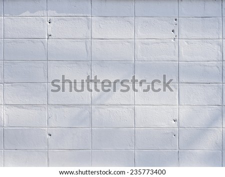 White concrete tile wall background and texture