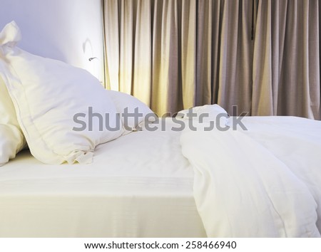 Mattress Bed sheet and pillow unmade in bedroom