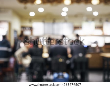 Blurred people in restaurant bar cafe background