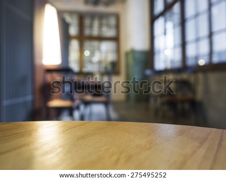 Table top with blurred Bar Cafe restaurant interior background