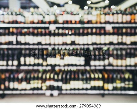 Wine Liquor bottle on shelf, Blurred Bar Restaurant background