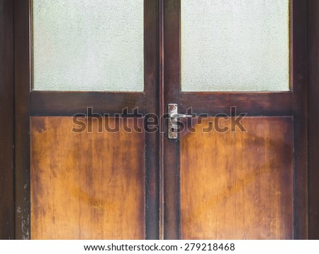 Wooden door frame with handle