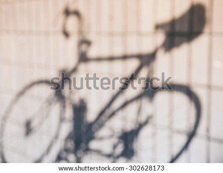 Bicycle shadow on wall Abstract background Vintage tone