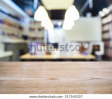 Table top with Blurred Retail shop interior background