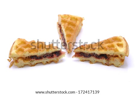 3 Piece Of Waffles With Grape Flavor Over White Background