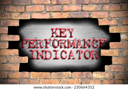 Business Concept - Hole At The Brick Wall And Found Caption Key Performance Indicator (KPI) Inside The Wall.