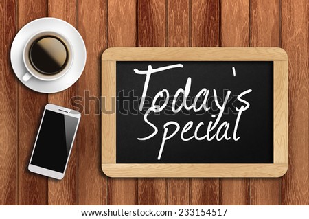 Phone, Coffee And A Chalkboard On The Wooden Table Written Today's Special.