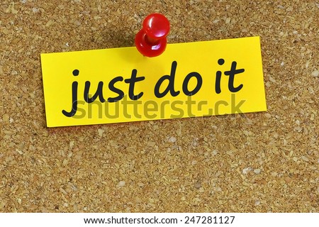 just do it word on notepaper with brown cork background