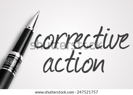 pen writes corrective action  on paper