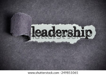 leadership word under torn black sugar paper
