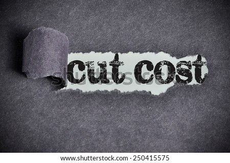 cut cost word under torn black sugar paper