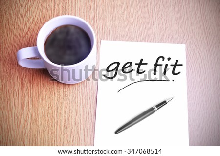 Black coffee on the table with note writing get fit