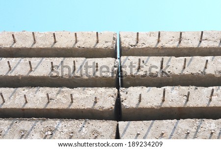 Stack of precast concrete used in construction.