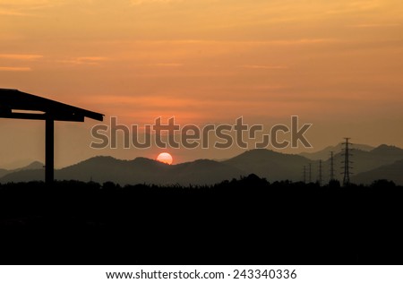 Cabin and high voltage post in sunset,Hua Hin landscape Thailand.