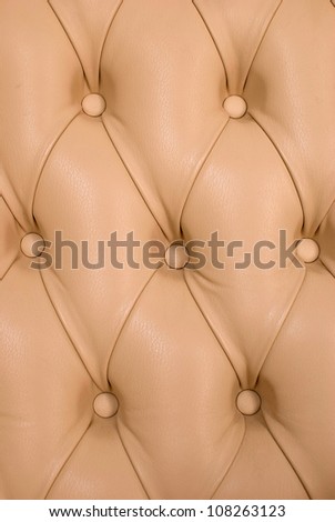 pink antique leather sofa texture close up