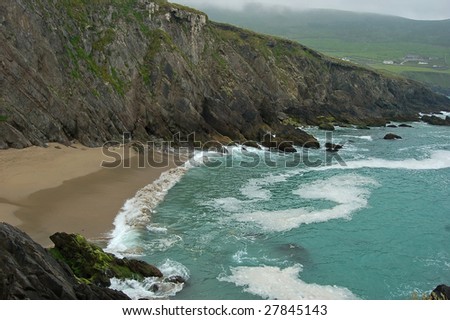 Sheltered beach with dangerous strong whirling current on the irish peninsula dingle