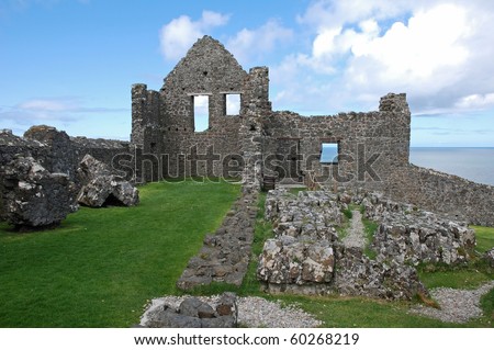 Remains of the past, ruins of Dunluce Castle on the cliffs of the Antrim coast in Northern Ireland