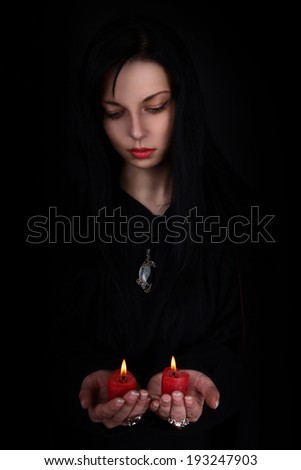 Girl with two heart candles