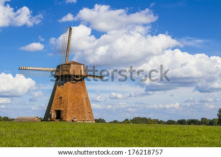 Wind mill taken on a hill in a summer Lithuania\'s afternoon close to Vilnius