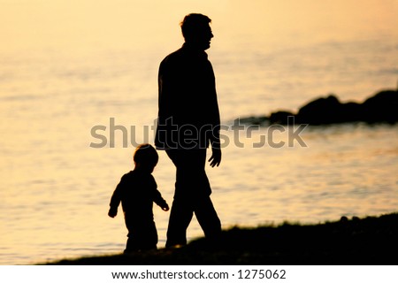 father and son walking. stock photo : Father and Son
